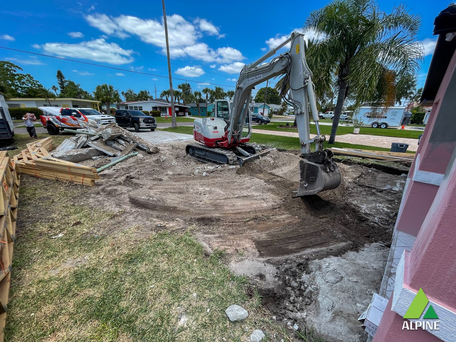 Drainage system installation by Alpine in flood-prone Indian Shores yard