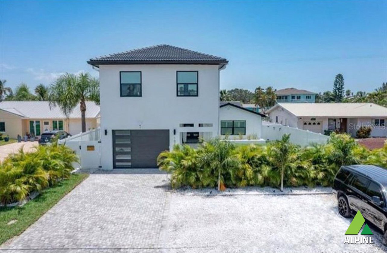 Alpine team performing water damage restoration in Indian Rocks Beach home