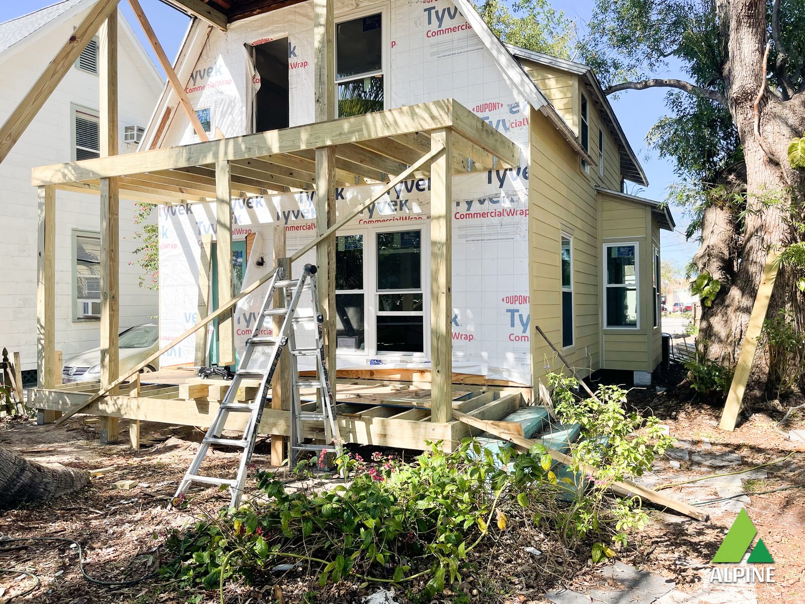 Water-damaged interior walls being restored after severe weather in Oldsmar home