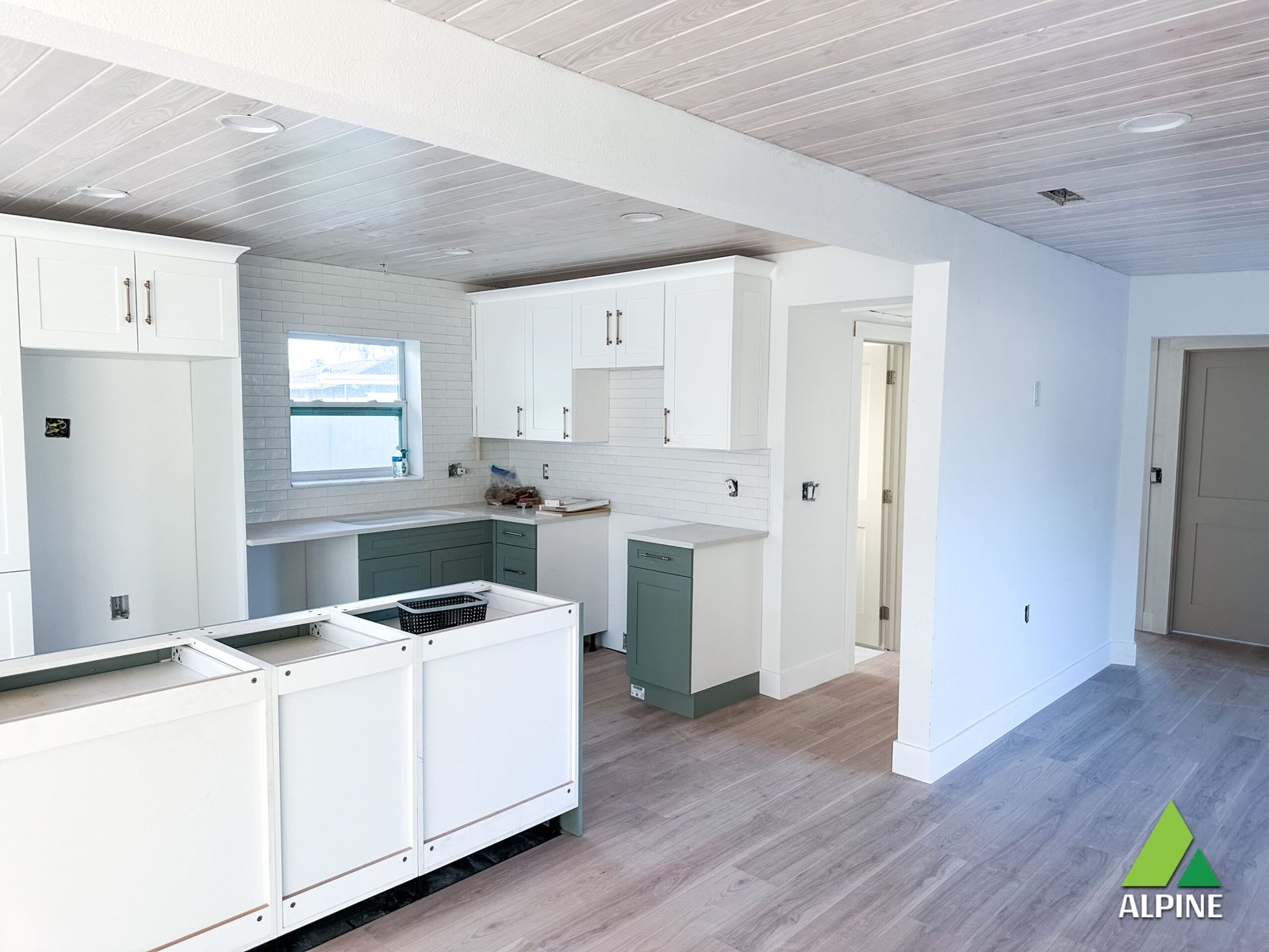 Modern kitchen remodel contractor in Largo FL completing custom cabinetry installation