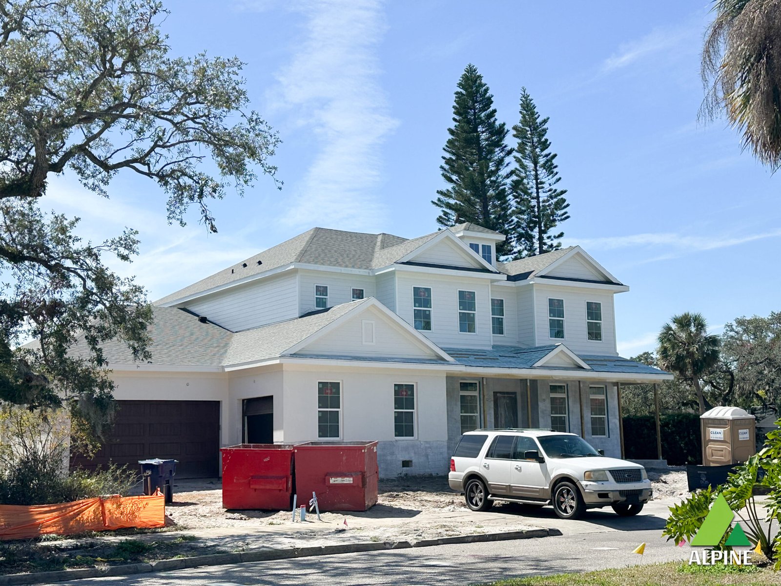 Wind damage contractor repairing roof in Madeira Beach