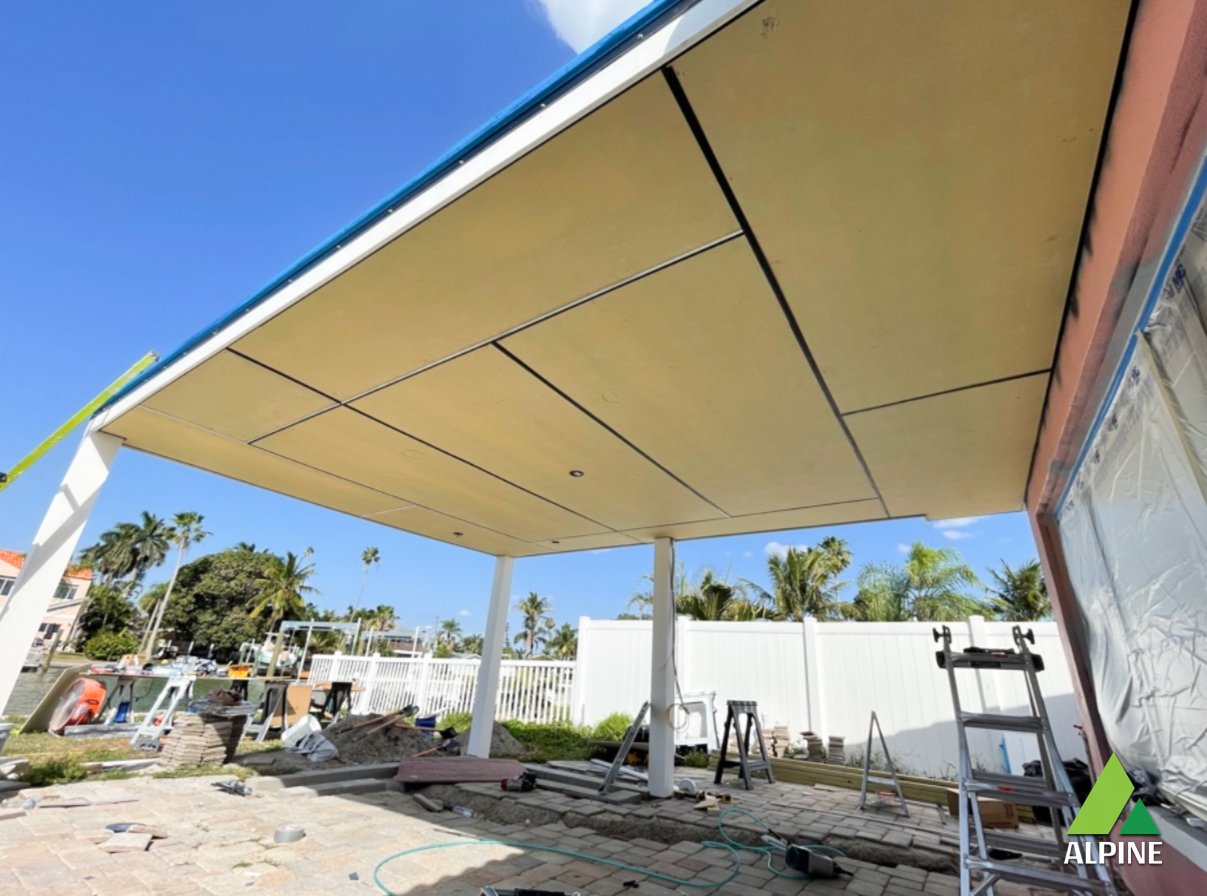 Wind damage specialists repairing roof in Belleair Beach after hurricane